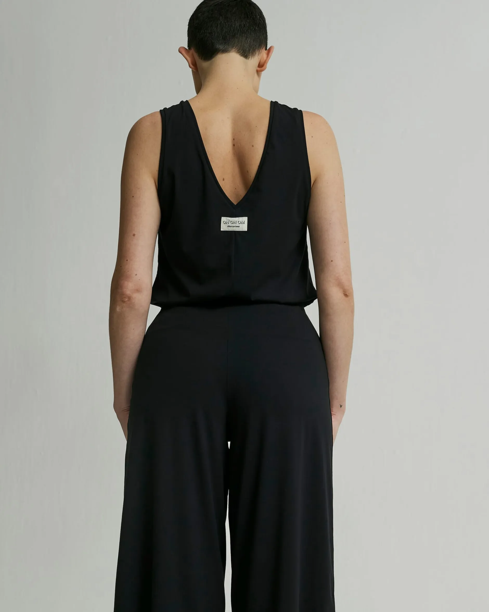 OH OH OM Ethical Sportswear Yoga-Top ärmellos Schwarz New